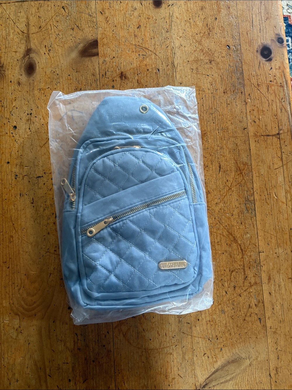 Quilted Light Blue Women’s Sling Backpack - Unbranded